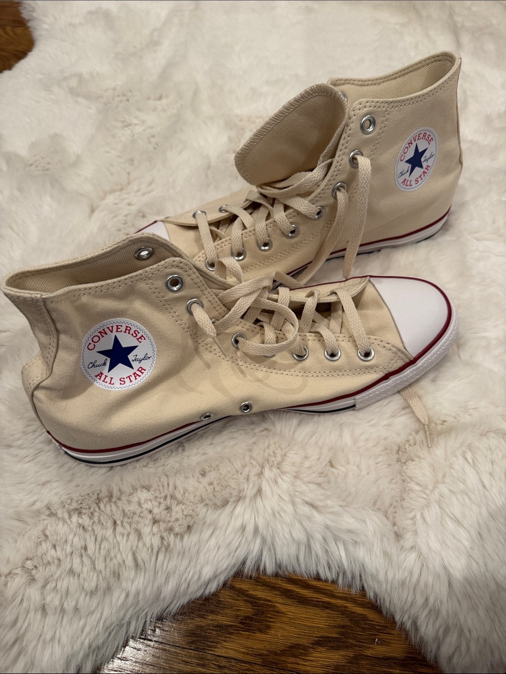 Converse Cream High Top Sneakers with Red and Blue Accents